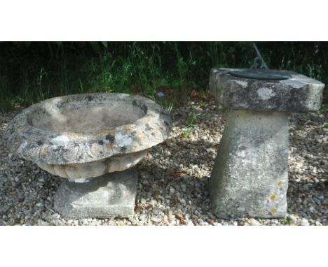 A composite stone planter with egg and dart rim in the Victorian taste, together with a sundial on composite stone and tapere