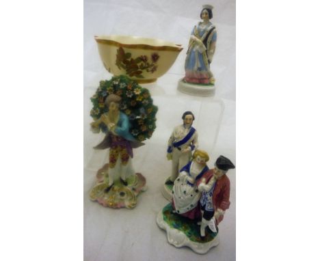 A Derby type bocage figure of a flute player, bearing unusual crowned monogram in gilt verso, a Royal Worcester blushware han