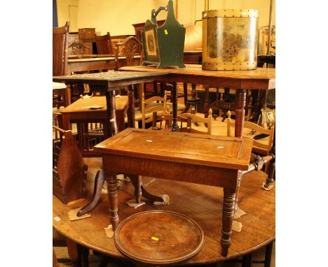 A 19th Century mahogany centre table on turned supports terminating in brown china castors, a mahogany low side table on turn