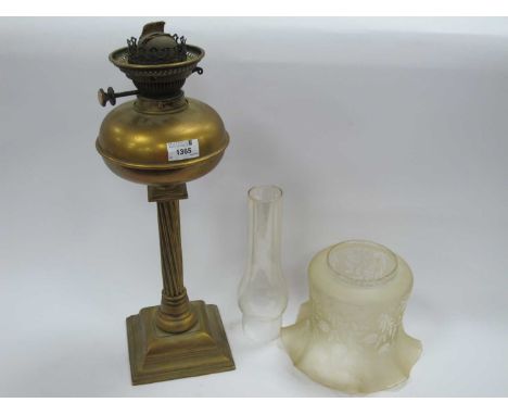 Hinks Oil Lamp, iron weighted, in brass with Wrythen column and stepped square base (shade cracked).