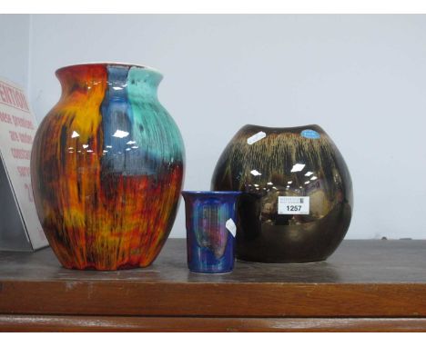 Poole Pottery - 'Precious' Small Purse Vase, 18cm high. Ovoid vase in traditional flame colours 24cm high. A blue lustre cyli