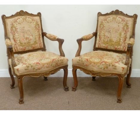 Pair late 19th century French walnut armchairs, tapestry upholstered seats backs and arms, W74cm x H99cm