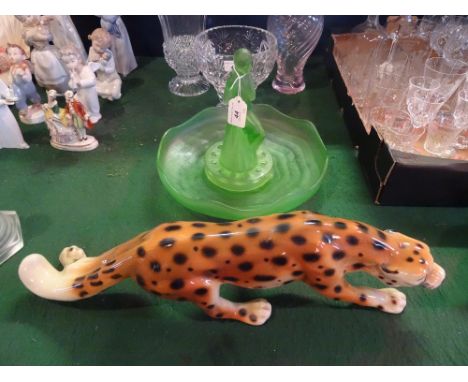 A 1930's green glass Art Deco centrepiece, formed as a seated maiden, together with a similarly coloured green glass bowl and