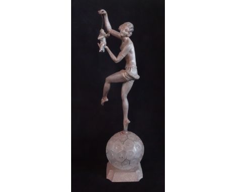 A 1930's Art Deco table lamp by Molins, France, a semi-clad female dancer holding a Pierrot puppet on globular frosted glass 