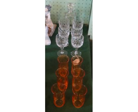 A spirit decanter of square form, together with a set of six lead crystal wine glasses and six yellow lustre tumblers.