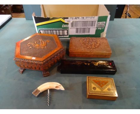 An Anglo Indian carved rectangular hinged lidded box, together with a Chinese pen box, an inlaid rectangular trinket box, a h