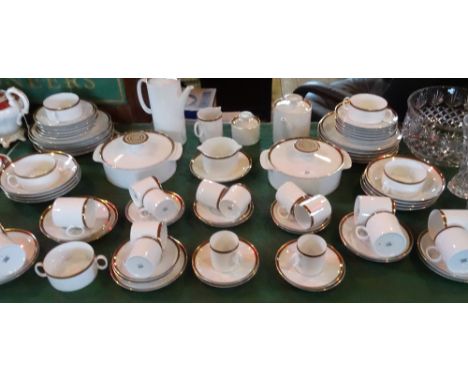 An extensive German made Thomas dinner service, comprising: two tureens, coffee pot, teapot, coffee cups, tea cups and saucer