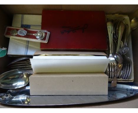 A box containing a quantity of silver plated flatware.