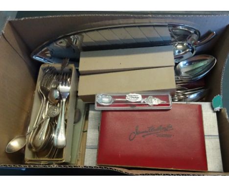 A small quantity of silver, to include: a toddy ladle, spoons and a bracelet formed of coins.