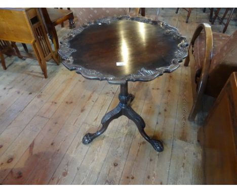 An early 20th century tilt-top occasional table, the birdcage block over single column on tripod supports terminating in ball
