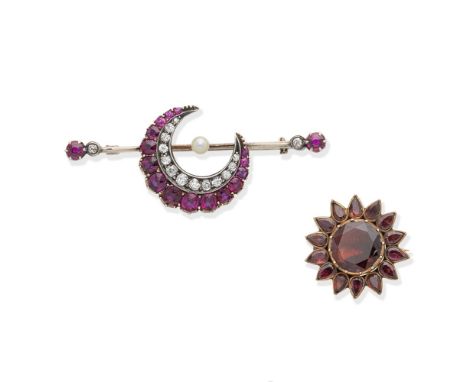 A 19th century garnet flower brooch, and a late 19th century ruby, diamond and pearl crescent brooch1st: Set throughout with 