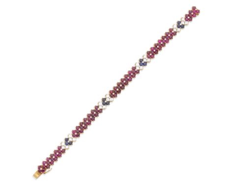 A ruby, sapphire and diamond bracelet, by PiagetOf chevron design, set throughout with calibré-cut rubies and sapphires and s