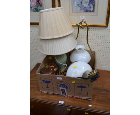 Two late Victorian ceiling paraffin lamps, converted for electricity, a near pair of stoneware converted jar lamps and an oli