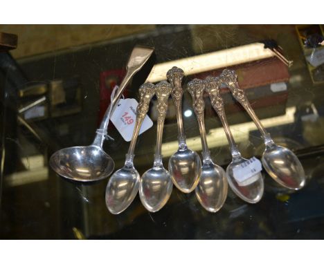 A set of six Glasgow silver Queen's pattern tea spoons, and an early 19th century silver sauce ladle