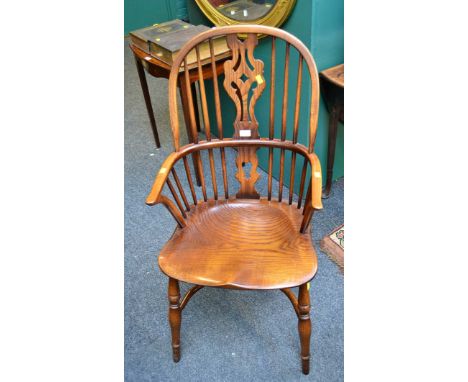 A reproduction double hoop and stick back Windsor armchair