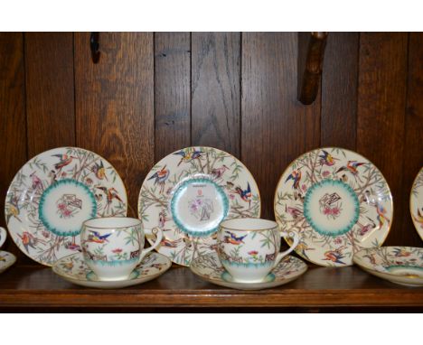 A graduated set of three Ridgway jugs, each transfer decorated with roses, together with a Minton part tea service polychrome