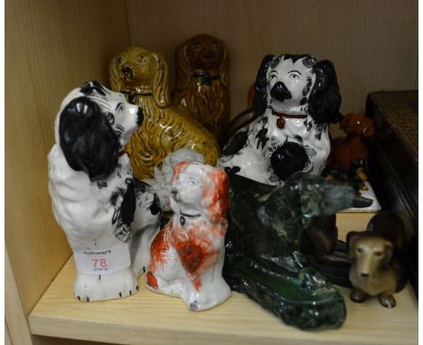 An early 19th century Crown Glass dog door porter/door stop, Beswick dachshunds, other items of pottery and metal figures of 