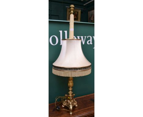 A cast gilt metal ecclesiastical-type table lamp