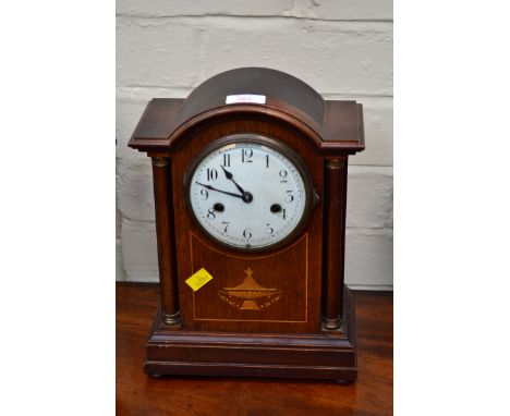 An Edwardian mahogany, boxwood inlaid and strung mantel clock, with eight day gong striking movement