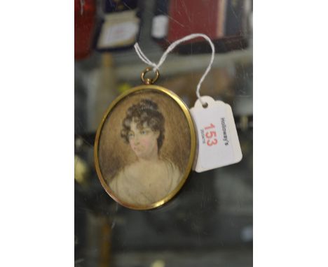 English school, 19th century A portrait miniature of a young lady watercolour on ivory oval, 8 x 6 cm (3 1/4 x 2 1/2 in)