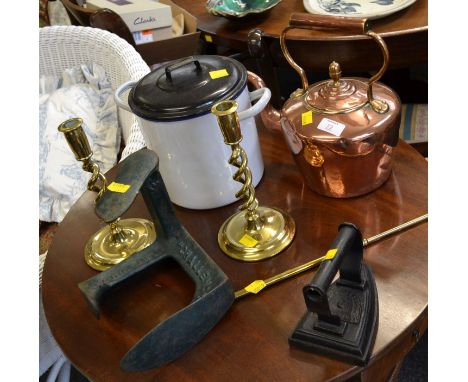 A pair of brass open helical twist candlesticks, copper kettle, cobblers last, toasting fork and other metal