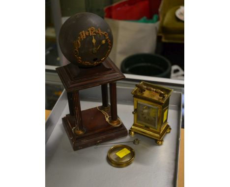 A sphere and portico mantel clock, together with a brass cased carriage timepiece containing a fusee pocket watch movement, n