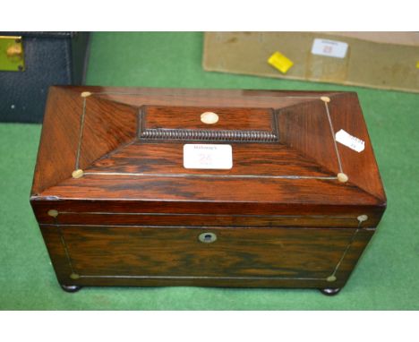 A Victorian rosewood tea caddy