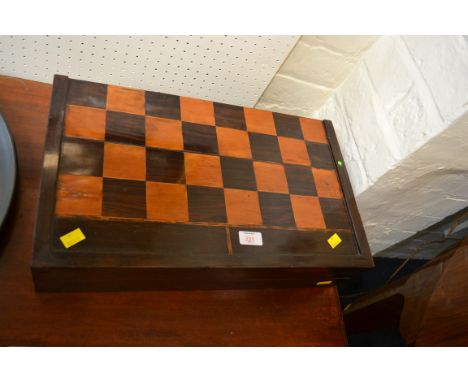 A 19th century coromandel and satinwood folding chess/backgammon board box, together with a Staunton Housemartin set of chess