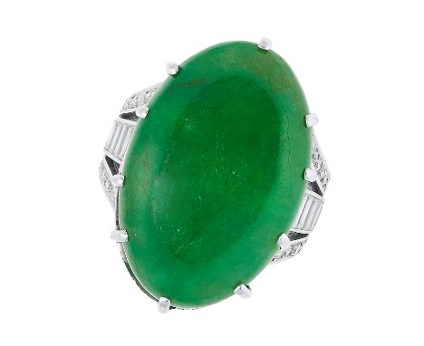 A VINTAGE JADEITE JADE AND DIAMOND DRESSS RING, BOUCHERON set with a jadeite cabochon, baguette and round modern brilliant cu