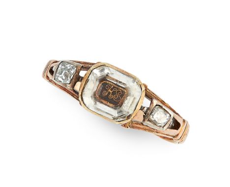 AN ANTIQUE STUART CRYSTAL AND DIAMOND MOURNING RING, 18TH CENTURY in high carat yellow gold, set with a central octagonal ste