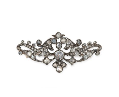AN ANTIQUE GEORGIAN DIAMOND BROOCH, EARLY 19TH CENTURY in yellow gold and silver, designed with scrolling motifs, set with ro