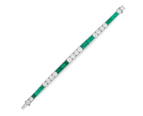 AN EMERALD AND DIAMOND BRACELET, BAILEY, BANKS &amp; BIDDLE designed as a single row of sixteen graduated step cut emeralds a