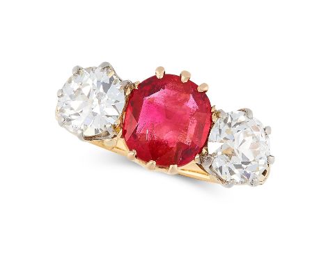 A 1.83 BURMA NO HEAT RUBY AND DIAMOND THREE STONE RING, CIRCA 1950 in 18ct yellow gold and platinum, set with a cushion cut r