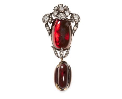 AN ANTIQUE GARNET AND DIAMOND MOURNING PENDANT / BROOCH, 19TH CENTURY in yellow gold and silver, the body set with an oval ga