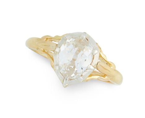 A DIAMOND DRESS RING in high carat yellow gold and silver, in the Georgian style, set with a pear shaped old cut diamond of 1