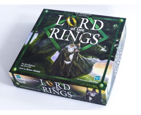 This is LORD OF THE RINGS THE BOARDGAME published by HASBRO in 2000. Comes complete and carefully used in original packaging.