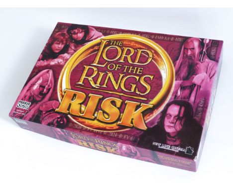 This is THE LORD OF THE RINGS RISK board game published by PARKER / HASBRO in 2002. Comes complete and unused in original pac