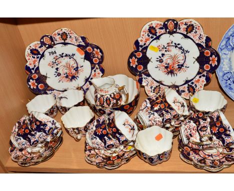 VICTORIAN IMARI DECORATED TEAWARES, impressed Rd No 115510 stamped Rd 118301 and pattern No 6075, to include two cake plates,