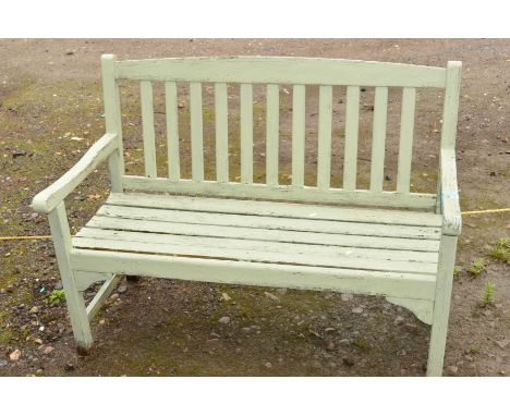 A LIME GREEN PAINTED GARDEN BENCH