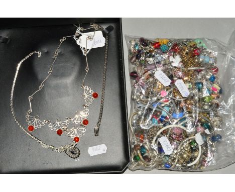 A SELECTION OF CHARMS AND CHARM BRACELETS, to include glass and enamel charms, many bracelets and charms believed to be base 