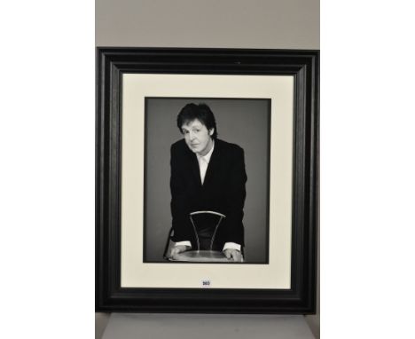 JOHN SWANNELL (BRITISH 1946) 'SIR PAUL MCCARTNEY 2007', an unsigned digital print, mounted, framed and glazed, approximate si