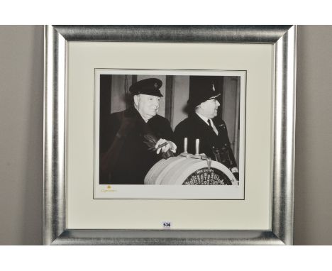 'WINSTON CHURCHILL', a limited edition print of the war time leader at the helm of a ship, 9/295, produced for the Cunard Shi
