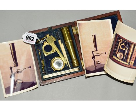 A VICTORIAN MAHOGANY CASED BRASS POCKET MICROSCOPE, engraved 'A. Abraham, Optician, Liverpool', with a small quantity of bone