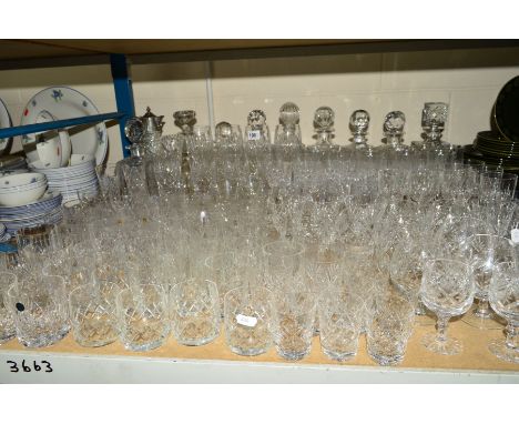 A QUANTITY OF CUT GLASS ETC, to include ten decanters of varying styles, red and white wine glasses, brandy, sherry and whisk