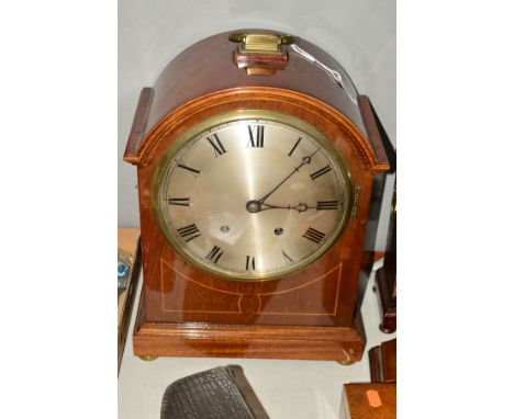AN EDWARDIAN MAHOGANY AND INLAID CADDY TOP BRACKET CLOCK, brass carry handle to the top, silvered dial, Roman numerals, eight