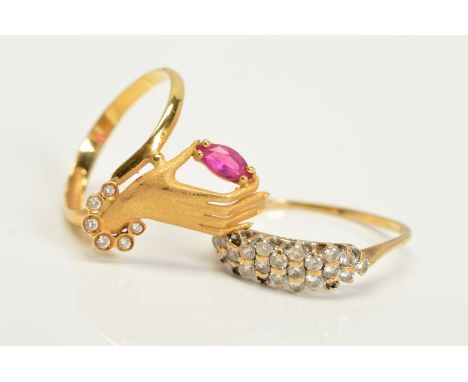 TWO MODERN DRESS RINGS TO INCLUDE a synthetic ruby and cubic zirconia dress ring, designed as a ladies hand, ring size R1/2, 