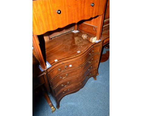 A REPRODUCTION MAHOGANY AND BANDED SERPENTINE CHEST OF FOUR LONG GRADUATED DRAWERS, with a brushing slide on outsplayed brack
