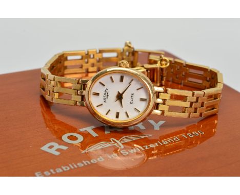 A 9CT GOLD LADY'S ROTARY WATCH, oval dial with gold baton hour markers and hands, quartz movement, bracelet measuring approxi