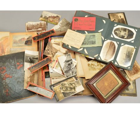 A COLLECTION OF EPHEMERA, containing an eclectic mix of Victorian and Edwardian postcards and photographs,  early-mid 20th Ce