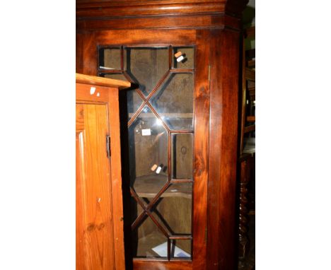 A MAHOGANY ASTRAGAL GLAZED HANGING CORNER CUPBOARD (key) a modern gout stool and another stool and a 19th Century walnut and 